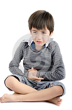 Little boy has stomach ache on white background