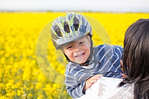 Little boy in a helmet.