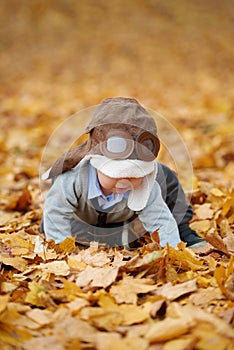 Little boy in helmet pilot