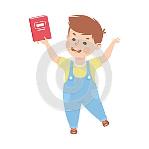 Little boy holding book in his raised hand cartoon vector illustration