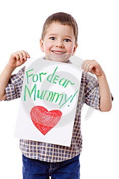 Little boy holding a drawing for mum