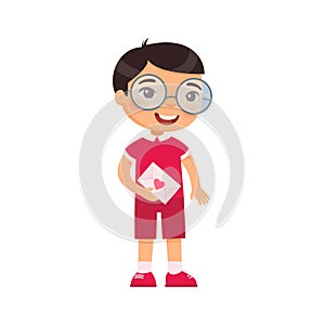 Little boy holding love letter flat vector illustration. Valentines Day celebration. Smiling kid character with greeting card.