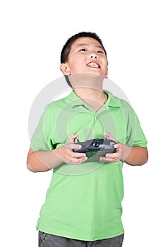 Little boy holding a radio remote control (controlling handset) for helicopter , drone or plane Isolated