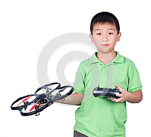 Little boy holding a radio remote control (controlling handset)