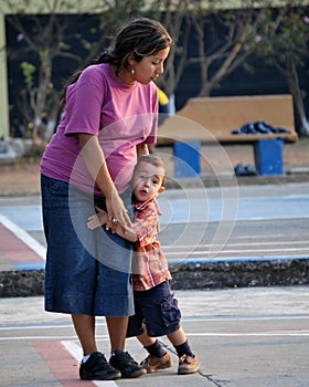 Little boy hugging his mother