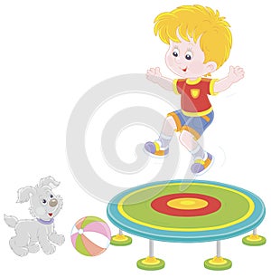 Little boy jumping on a trampoline