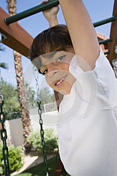 Little Boy On A Jungle Gym