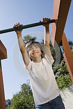 Little Boy On A Jungle Gym