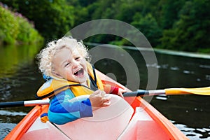 Little boy in kayak