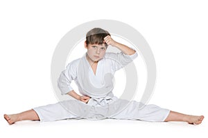 Little boy in kimono on the floor