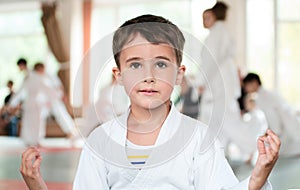 Little boy in kimono meditation