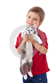 Little boy with kitty in hands