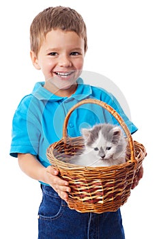 Little boy with kitty in wicker