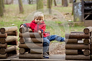 Little boy, learning how to ride a bike in the park