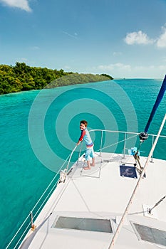 Little boy at luxury yacht