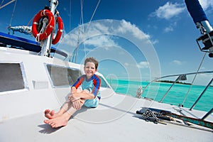 Little boy at luxury yacht