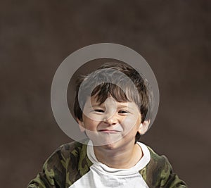 Little Boy Making Silly Face With Copy Space photo
