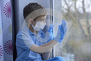 Little boy in a medical mask.