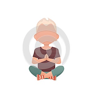 A little boy meditates in the lotus position. Isolated. Cartoon style.