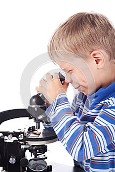 Little boy with microscope