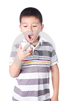 Little boy with mobile phone in hand isolated on white background