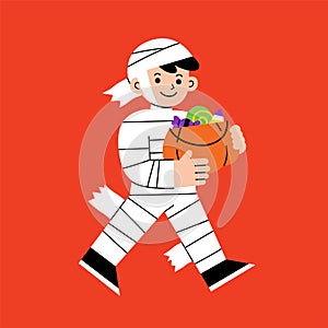 Little boy in Mummy costume with pumpkin basket for Trick or Treat on white background.