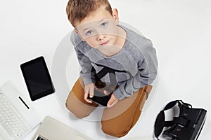 Little boy and new technology