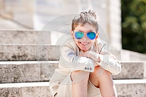 Little boy in a nice suit and glasses. Back to school. Children portrait