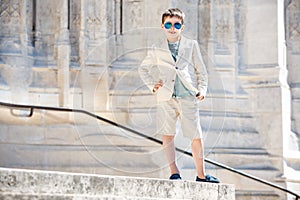 Little boy in a nice suit and glasses. Children portrait