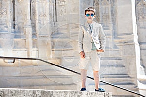 Little boy in a nice suit and glasses. Children portrait