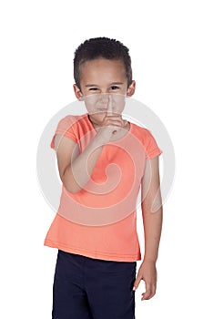 Little boy with organge shirt pointing