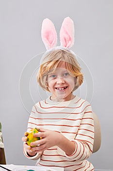 Little Boy Painting Easter Egg