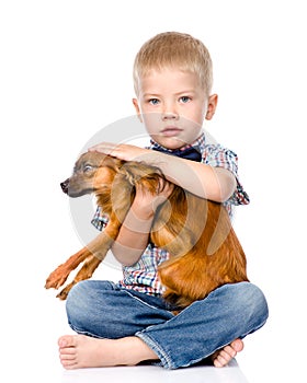 Little boy patting dog head. isolated on white background