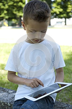 Little boy with PC tablet