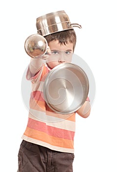 Little boy play knight with kitchen