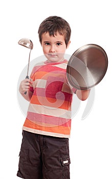 Little boy play knight with kitchen