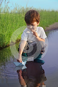 Little boy play in water