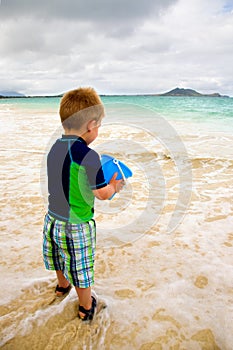 Little Boy Playing on the Beach