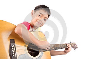 Little boy playing classic guitar course on white background