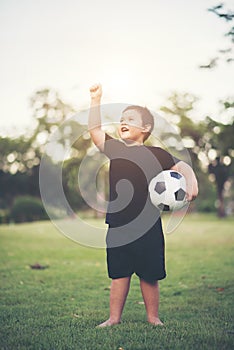 Little Boy playing  football