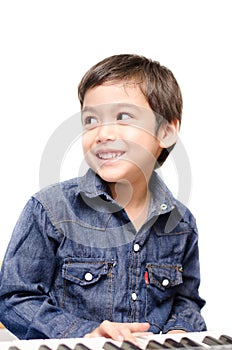 Little boy playing keyboard
