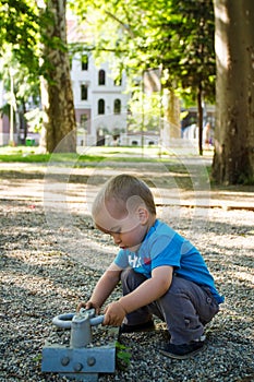 Little boy playing in nature