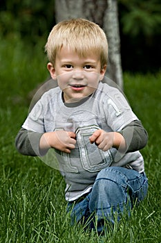 Little Boy Playing Outside