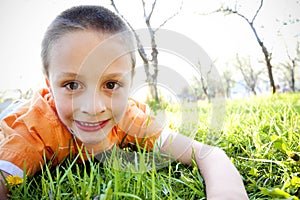 Little Boy Playing Outside photo