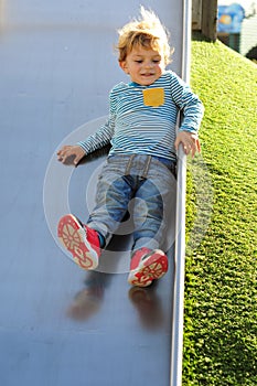 Little boy playing at the park