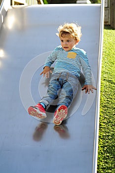 Little boy playing at the park