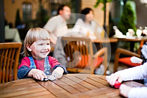 Little boy playing and smiling