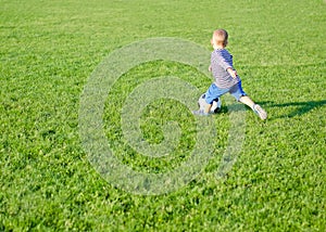 Little boy playing soccer