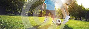 Little Boy Playing Soccer With His Father Concept