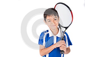 Little boy playing tennis racket and tennis ball in hand